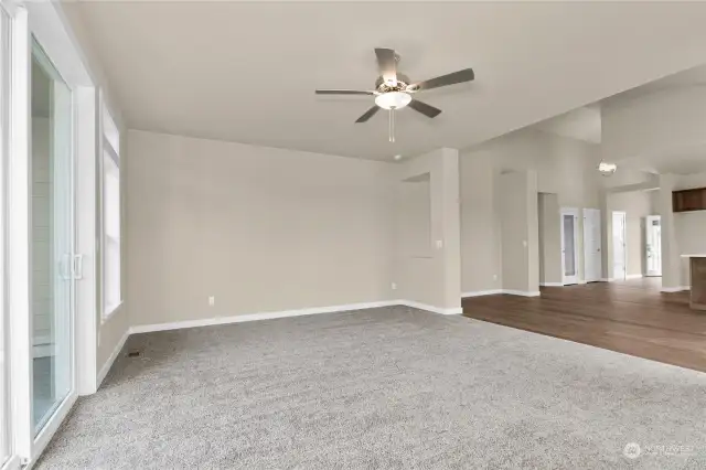 Living room includes ceiling fan as a standard feature. Photo for illustration only, not actual