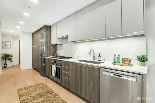 Loads of contemporary cabinets and counter space