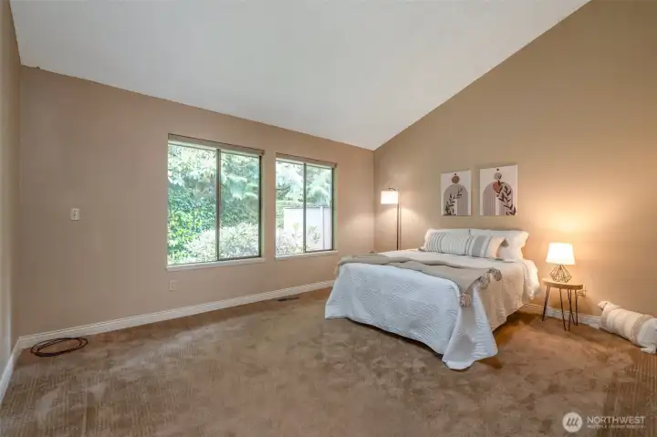 Spacious primary suite with dual closets and ensuite bath for your own private retreat.