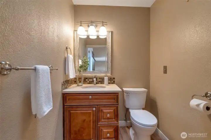 Updated second bath with clean, modern finishes and thoughtful design.