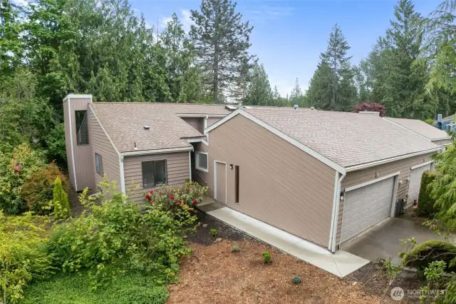Convenient attached garage with updated doors and millwork—plus extra storage potential.