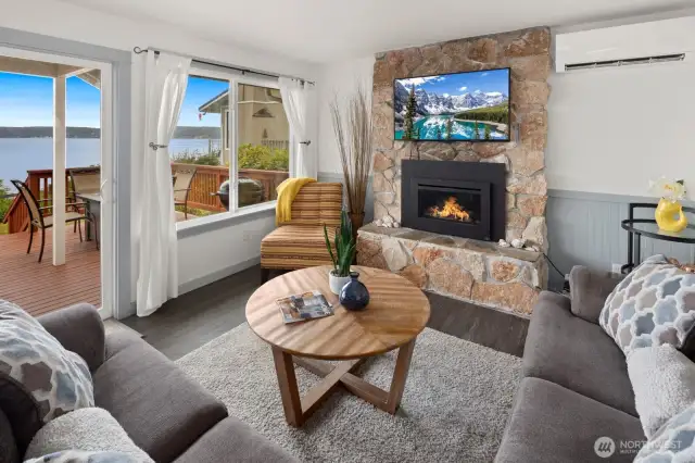 Living room open to expansive view deck