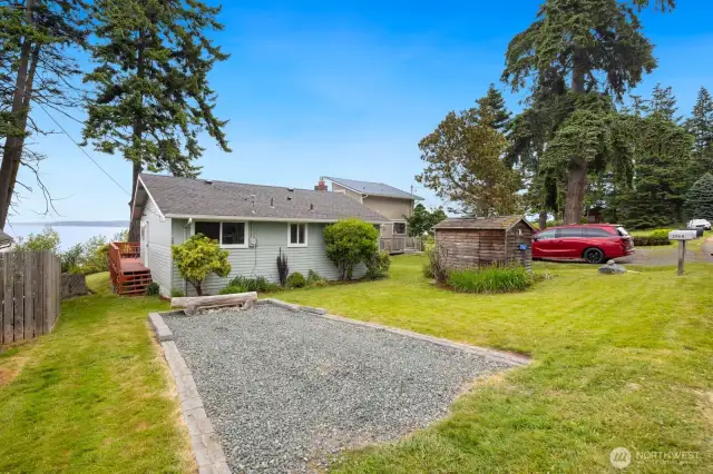Front of home with gravael driveway