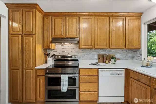 The kitchen is near to the living room and dining room but has some separation to give you some peace while cooking.