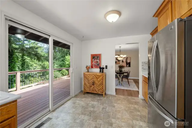 This are could be a small breakfast nook or a spot for additional storage/counter space.