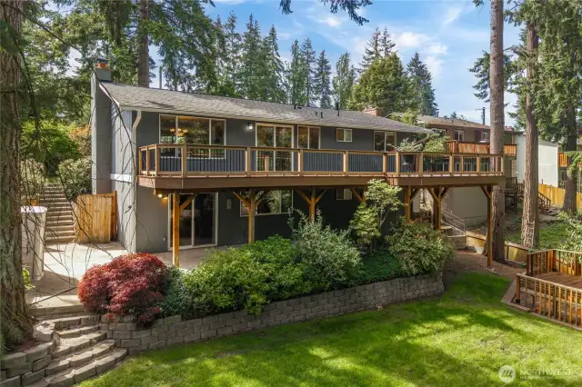 This home is bigger than the front makes it seem! Upstairs is a massive Trex deck that stretches the entire length of the home with tons of room for entertaining of peaceful outdoor living.