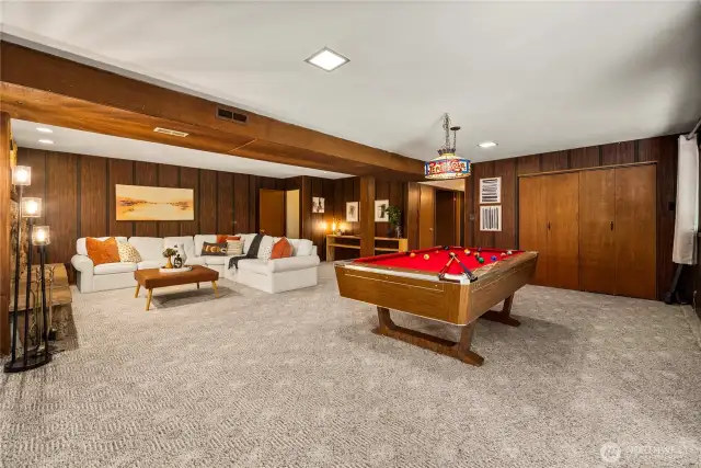 Love these retro vibes, but you could also do some minor updating down here to create a more modern living space. This home lives much larger than its 2,420 sq ft.
