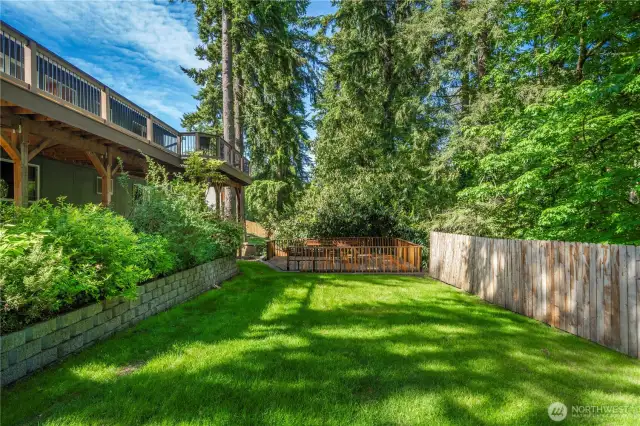 On the lower level you have a large beautiful lawn with healthy grass and a second large deck space.