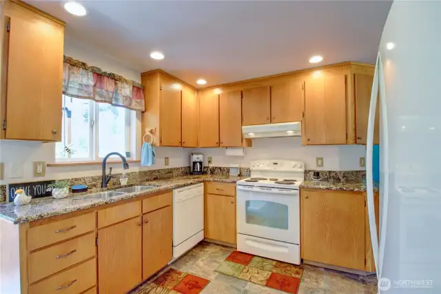 lovely kitchen with an abundance of cabinetry