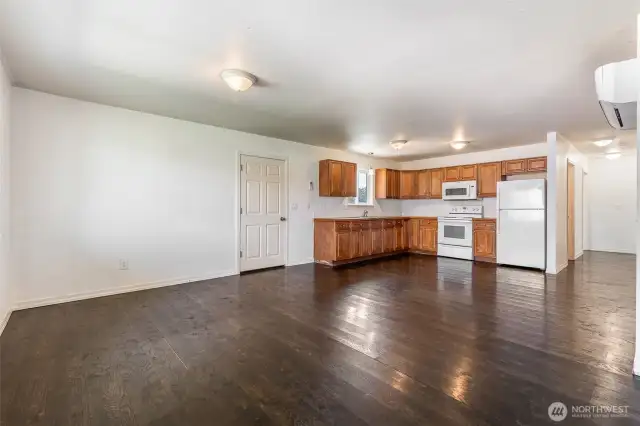 Living Room & Kitchen to the entry door to the garage