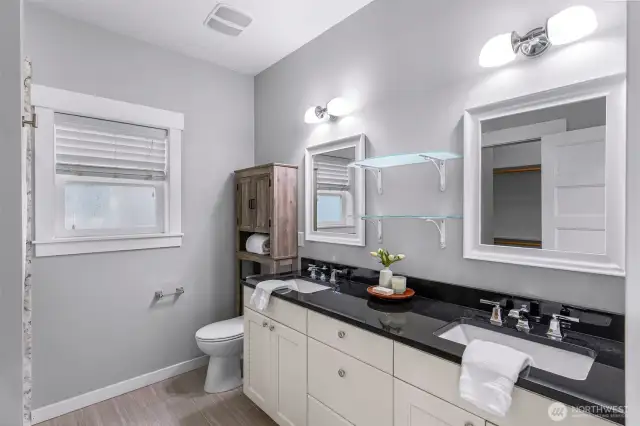 Primary Bathroom has double sinks and large walk-in shower