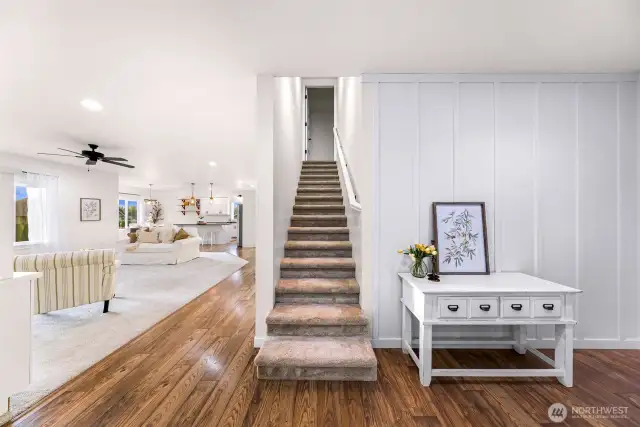 Stairway leads to bonus space and additional bedroom