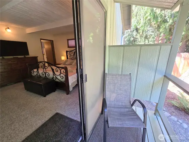 Primary Bedroom leads to covered back porch