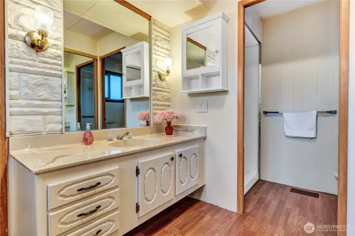 Primary bathroom has a new toilet & new fan.