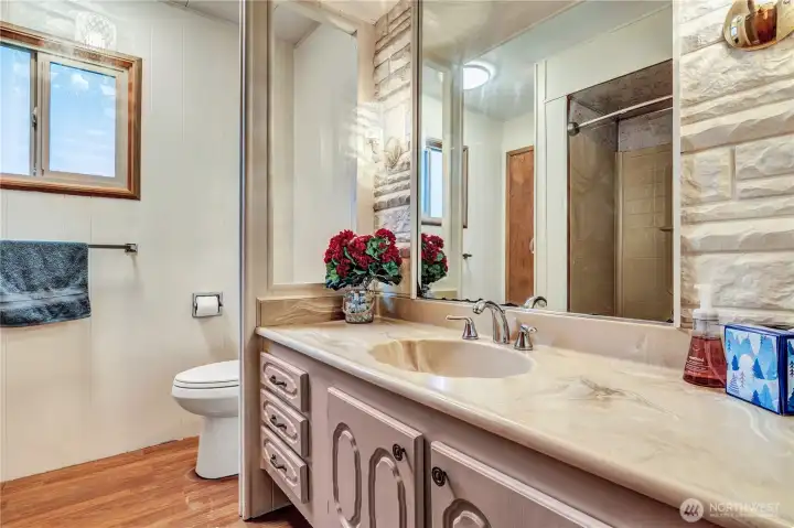 Main bathroom has a new toilet & new fan.