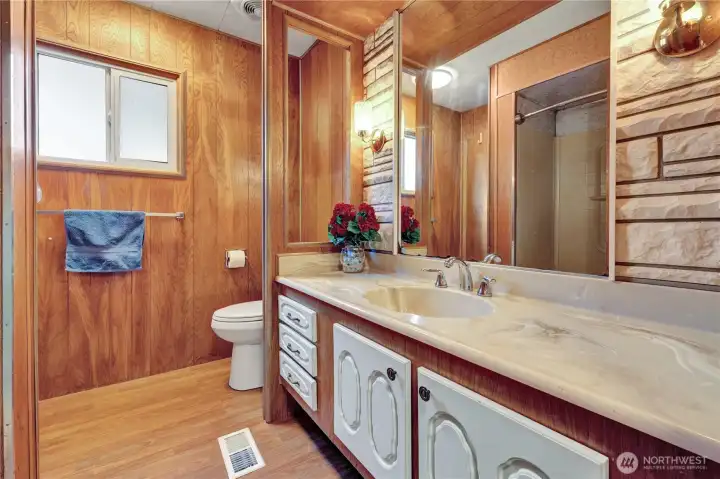 Main bathroom has a new toilet & new fan.
