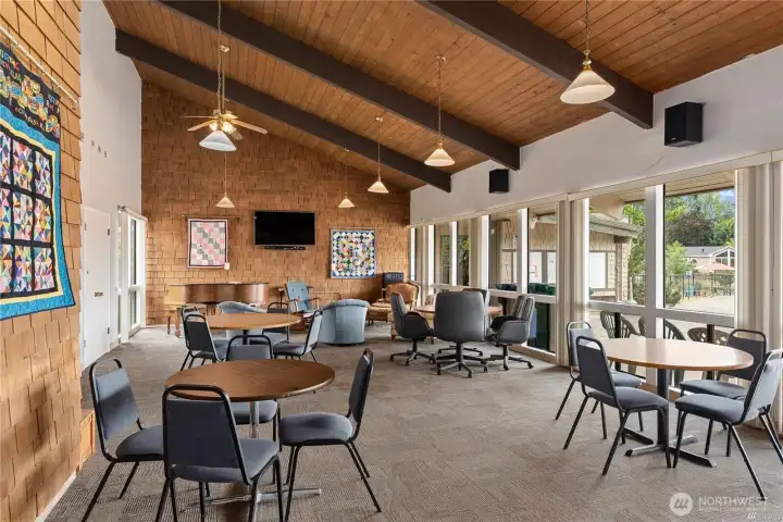 Meeting room is the main hub of the clubhouse. People meet for coffee, groups gather to watch sports games, people enjoy playing the piano, have birthday parties & much more here.