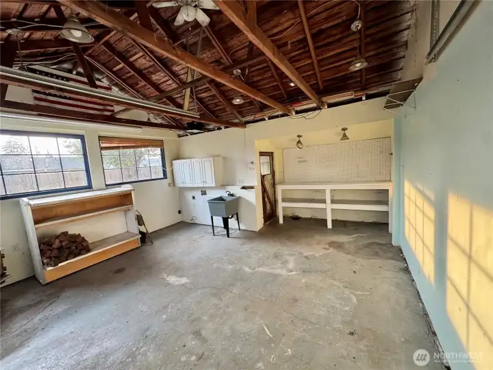 Garage interior. Laundry hookups & utiity sink.