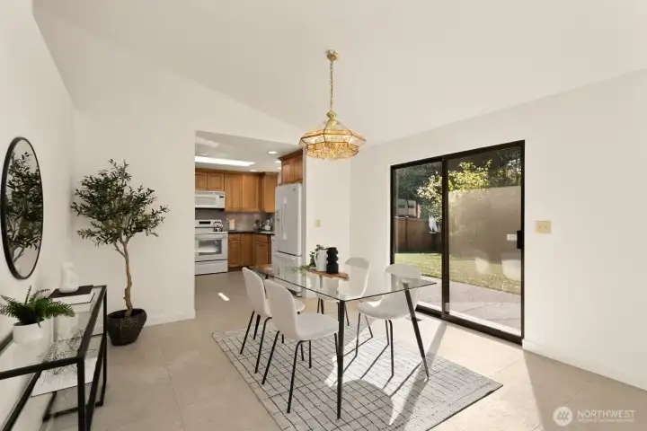 Dining room with slider leading to your backyard