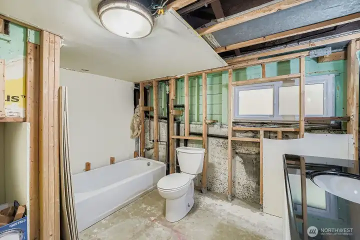 Partially finished and plumbed full bath, just needs the finish work.