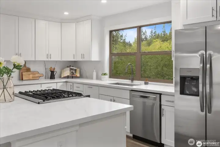 Soft close cabinets and drawers provide an elegant touch. Note all the cabinetry!