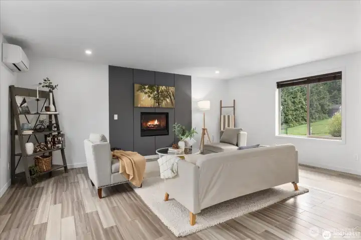 A gas fireplace brightens and warms the room on chilly Pacific Northwest nights