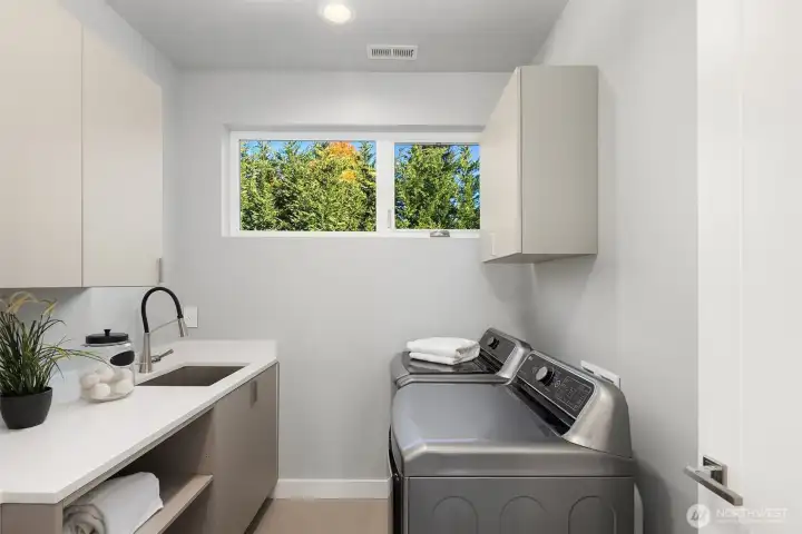 Conveniently located laundry room upstairs.