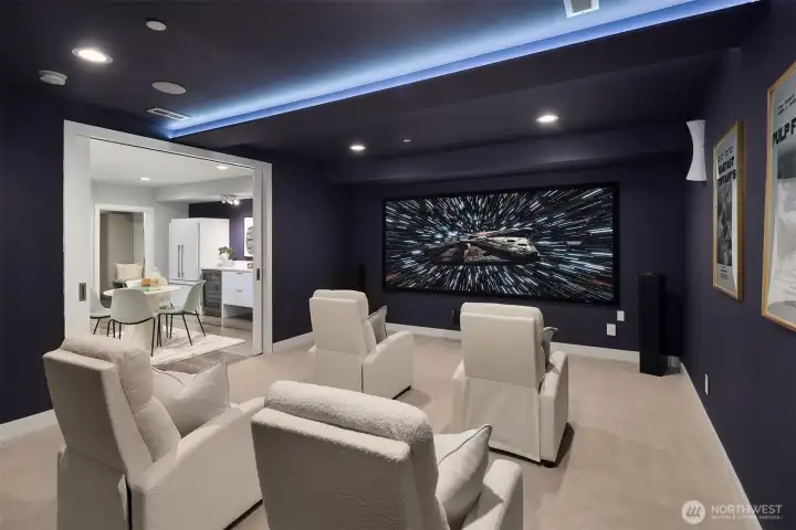 A lower level theater room perfect for nights in.