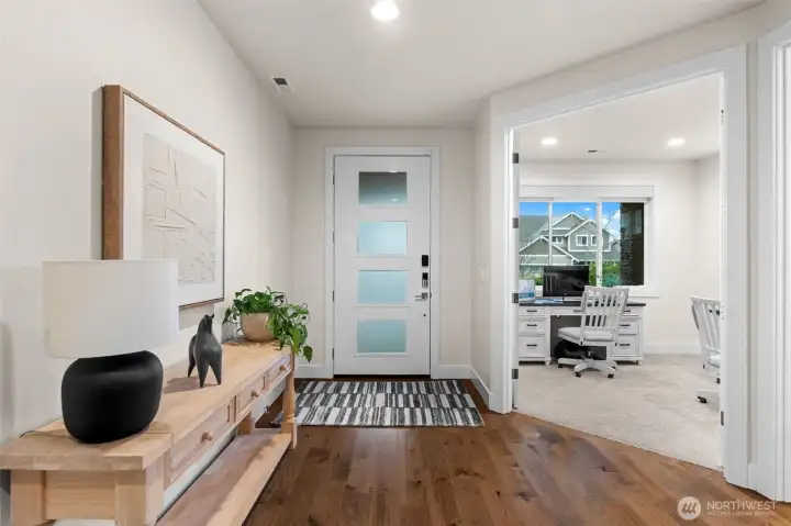 Welcome your guests in this beautiful foyer, accentuated with luxury laminated flooring.