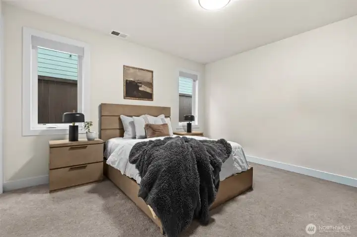 Enjoy this guest suite attached with bathroom, or convert into a primary room on the main floor.