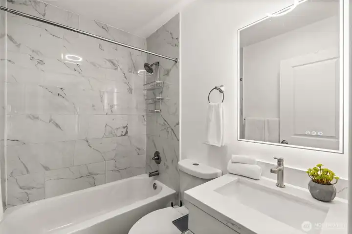 Full Bath with backlit vanity mirror