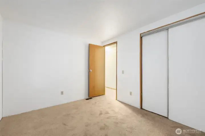 Secondary bedroom with spacious closet.