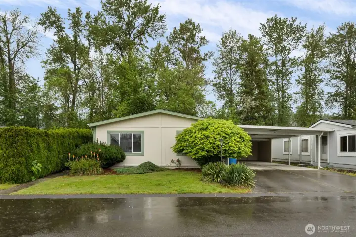 Another view of the home's attractive front exterior in Mountain View Estates 55+ community.