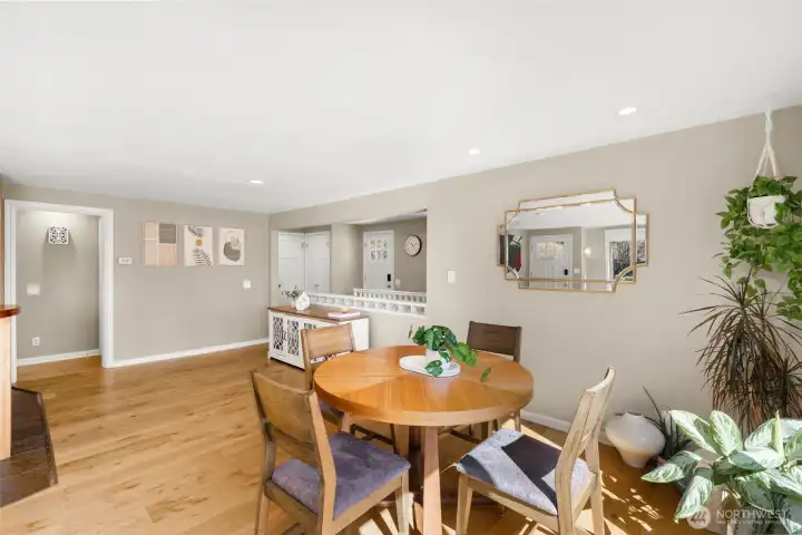 Easy living on one floor, with two bedrooms, a fully renovated bathroom, new GE washer/dryer, and a warm open concept living space.