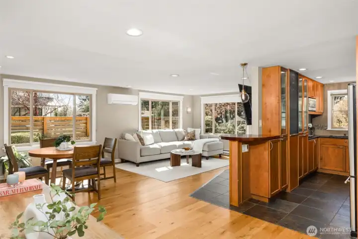 Open-concept floor plan that seamlessly flows from the kitchen to the living room.