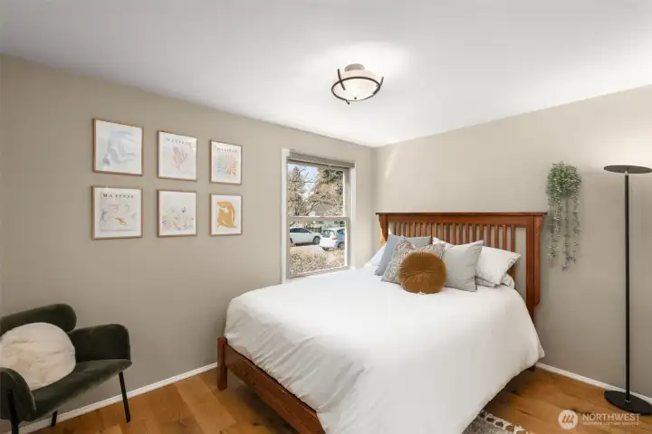 Secondary Bedroom on the Main-level features hardwood floors and a spacious closet.