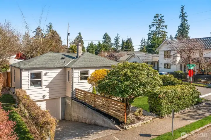 Attached finished garage with epoxy floors - perfect for a gym, storage or parking!