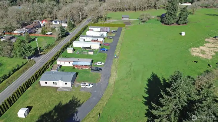 Open space farming area across the driveway. Big yard area adjoins this lot.