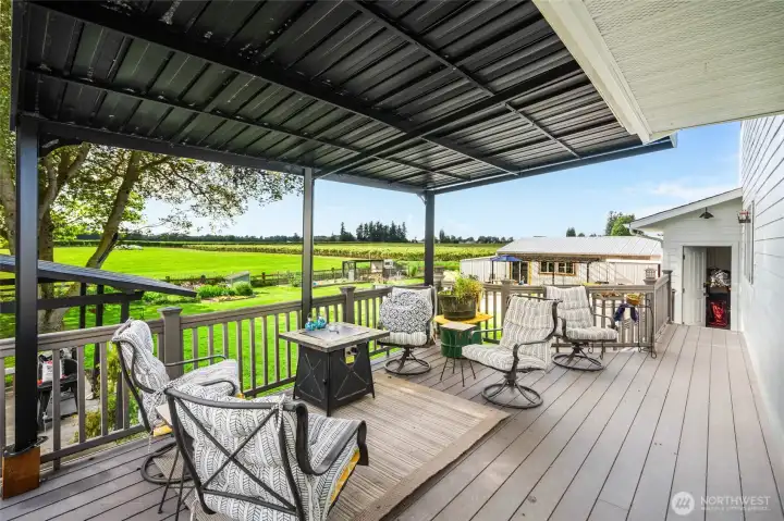 raised deck off kitchen with expansive west-facing views