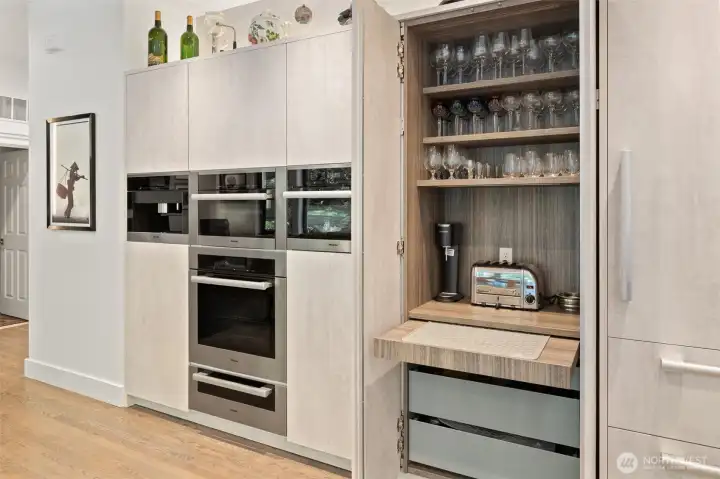 Miele appliance suite including coffee maker, steaming oven, and warming drawer. Plus Sub-Zero fridge!