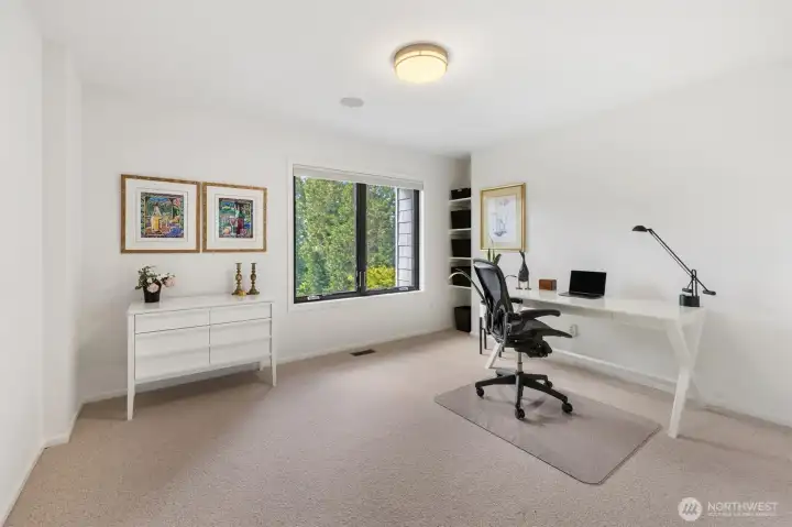 Second office upstairs in the primary wing of the house. This large room can also be used as a 5th bedroom!