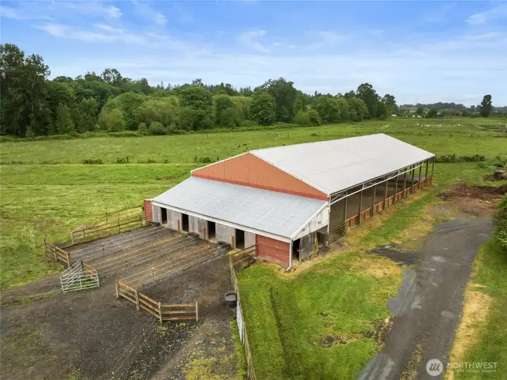 Covered arena and stalls with pasture access