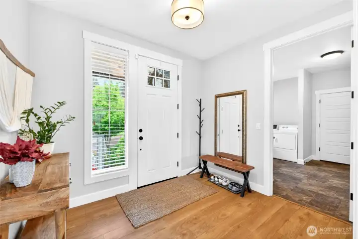Facing the entry door. Plenty of room for guest shoe storage. You can see the entry to the mudroom. Facing the entry door. Plenty of room for guest shoe storage. You can see the entry to the mudroom.