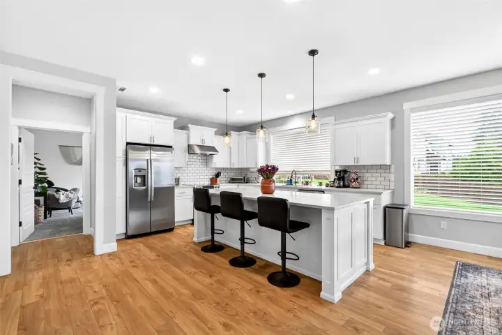 You will love this modern chef's kitchen. Notice the hall to the left, which leads you into the master suite that takes up the entire other end of the home. You will love this modern chef's kitchen. Notice the hall to the left, which leads you into the master suite that takes up the entire other end of the home.