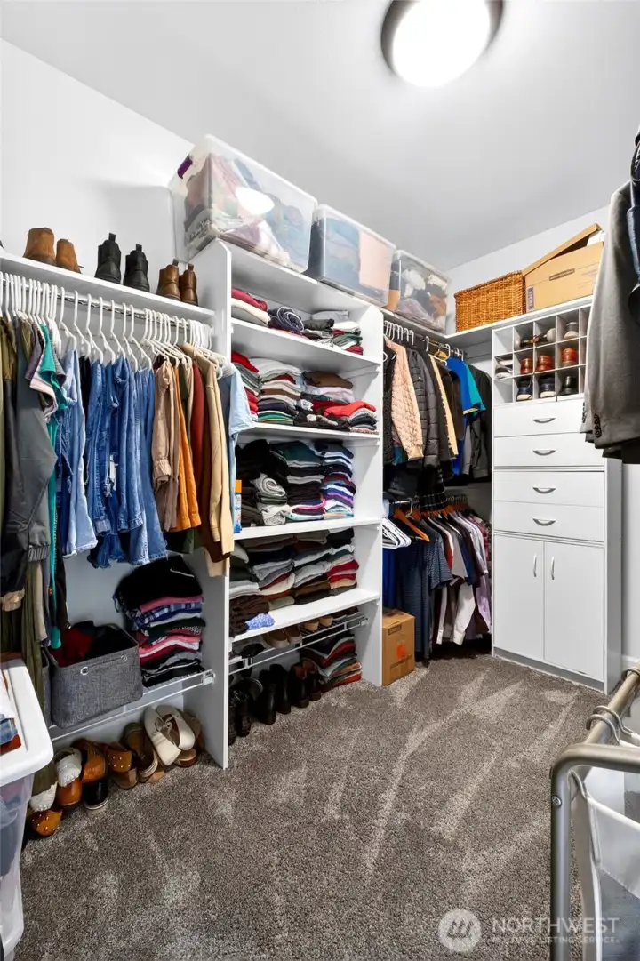 Generously sized walk-in closet. Generously sized walk-in closet.