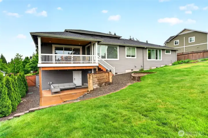 Right below the covered deck is another private patio. Right below the covered deck is another private patio.