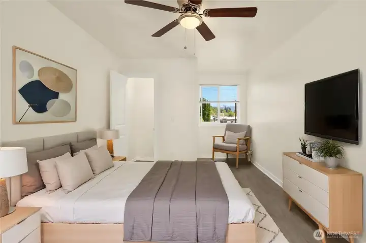 Primary Bedroom with walk in closet, 3/4 bath with walk in shower