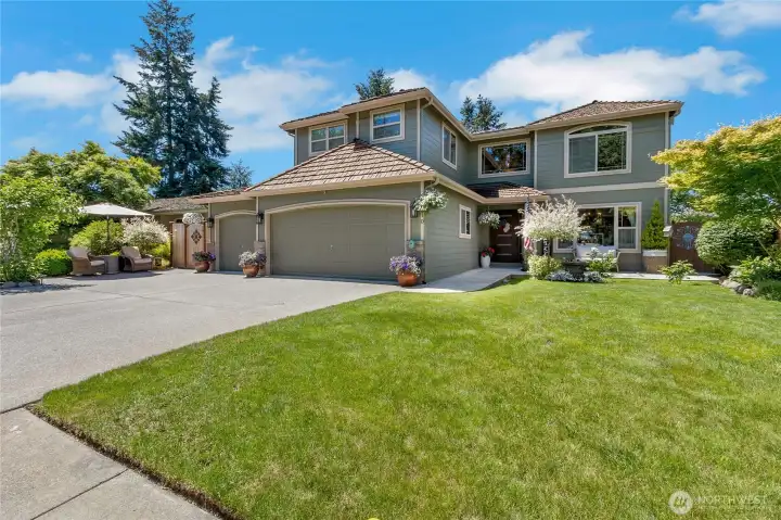 Thoughtfully maintained landscaping and pride of ownership are evident from the moment you arrive.