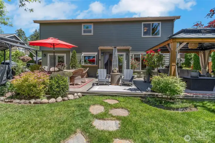 Thoughtfully designed for year-round enjoyment, multiple gathering areas—including heated seating spaces—invite conversation, relaxation, and outdoor entertaining well beyond the summer months.