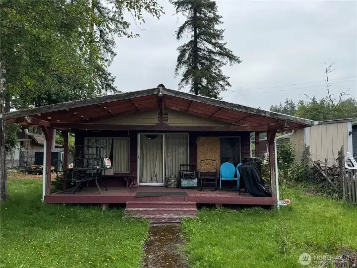 Deck on back of house looks over the lake